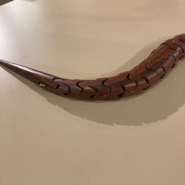 Artist signed rosewood articulated snake (21"L, 1"W)