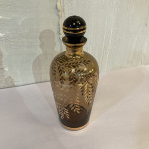 Vintage hand blown smoky/gold glass dresser bottle (8.5"h, 3.5"w)