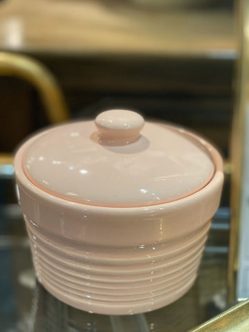 Light pink container with lid