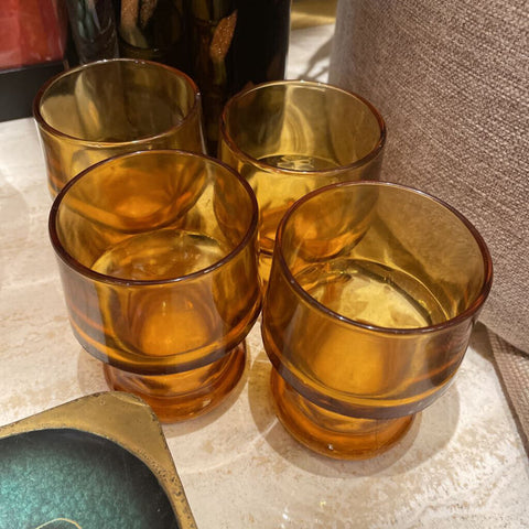 Set of four orange glasses