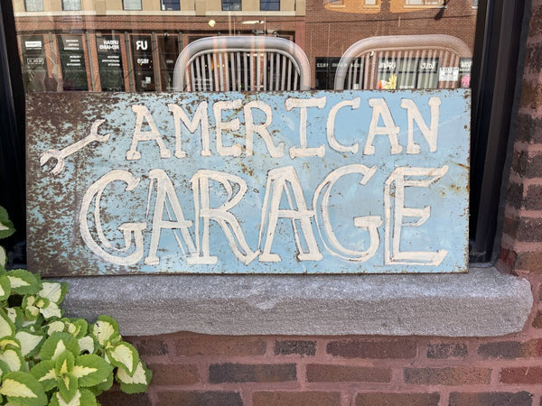 American garage vintage tin sign