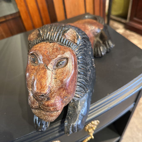 Carved wood Lion lying down 18in