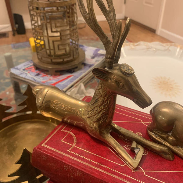 Set of resting brass deer