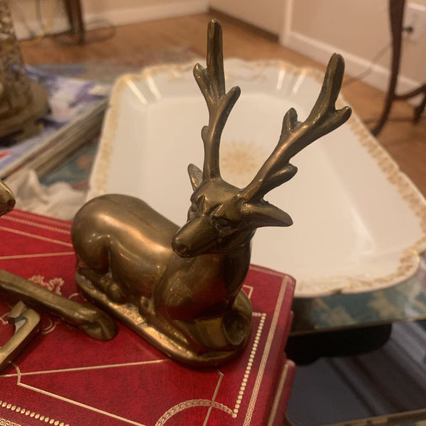 Set of resting brass deer