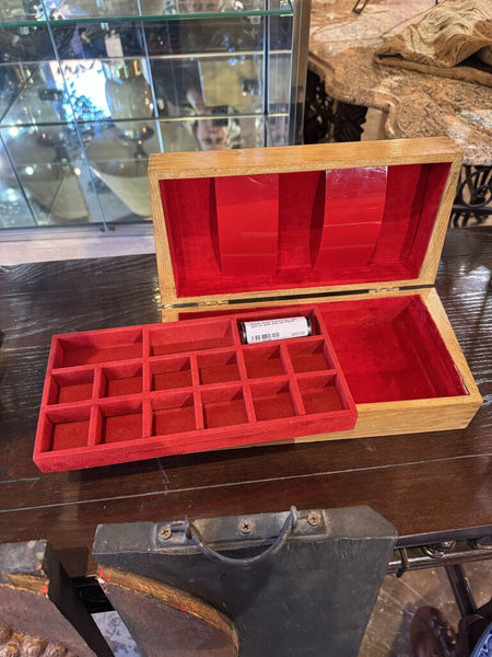 Blonde wood jewelry box with coat of arms and red interior