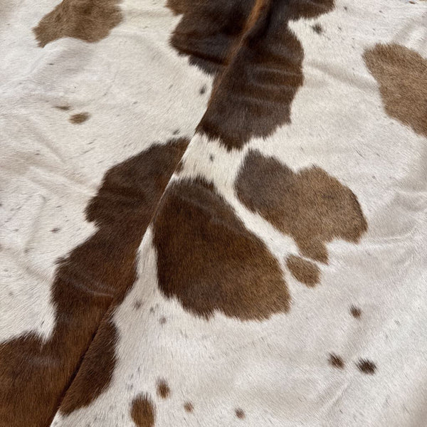 Large cow hide off white and light brown approx 78"x94"