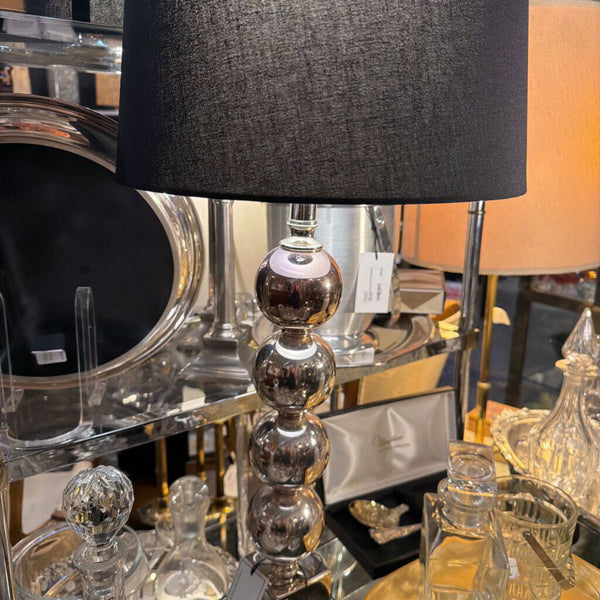 Silver balled lamp with black shade