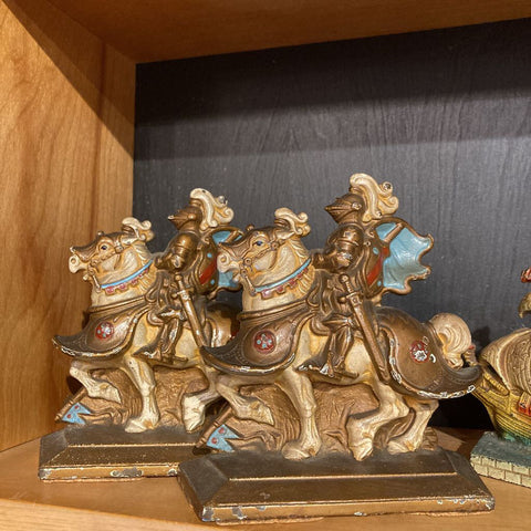 Pair antique cast iron knights on horses bookends (5")