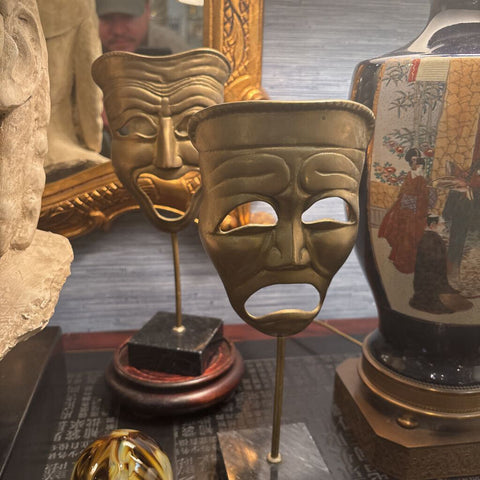 Vintage brass opera masks on marble base pair