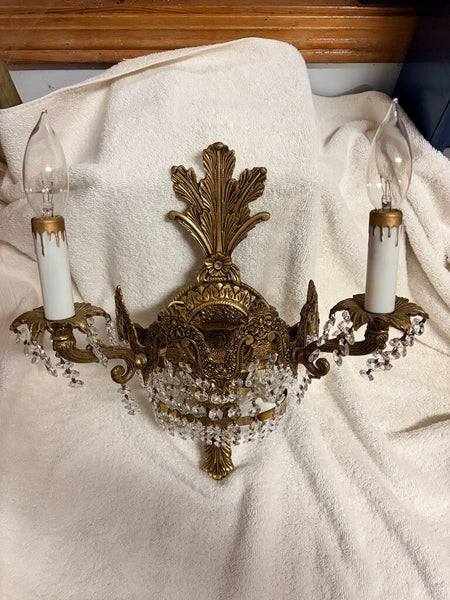 Early 20th century French art deco cut crystal wall sconce s pair with 4 lights each and gorgeous Strauss crystals. Gorgeous floral motif-approx 16t x13w x7d For pick up only