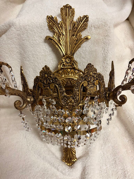 Early 20th century French art deco cut crystal wall sconce s pair with 4 lights each and gorgeous Strauss crystals. Gorgeous floral motif-approx 16t x13w x7d For pick up only
