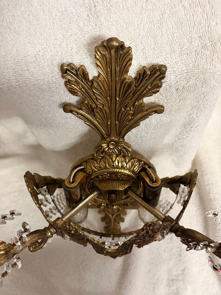 Early 20th century French art deco cut crystal wall sconce s pair with 4 lights each and gorgeous Strauss crystals. Gorgeous floral motif-approx 16t x13w x7d For pick up only