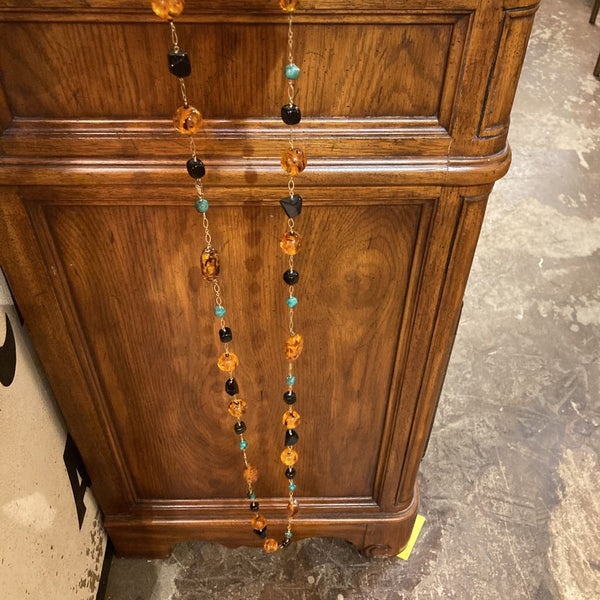 Vintage amber, jet & turquoise station necklace (28 in. long)