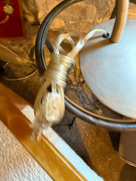 Silver and black UFO lamp