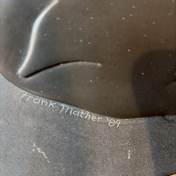 Frank Mathers black slate carved wall hanging of cat 1989 approx 13x10