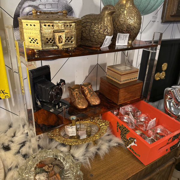 Tortoise/ lucite vanity shelf, or bathroom shelf.