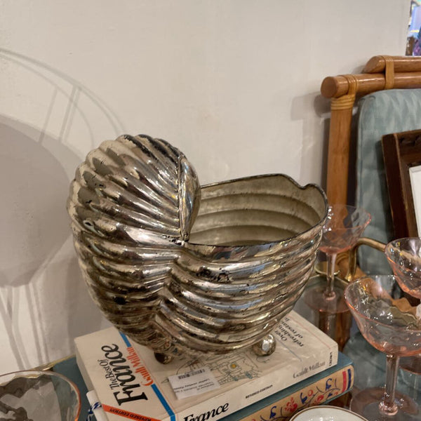 Silver nautilus shell champagne bucket on feet
