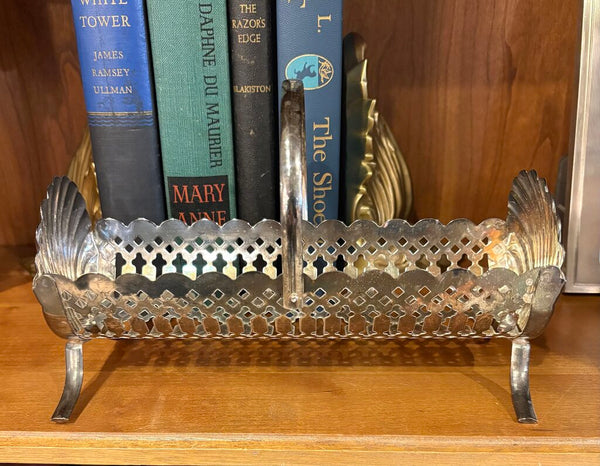 VINTAGE SILVER PLATE HANDLED BASKET WITH SHELL MOTIF JEWELRY CADDY |