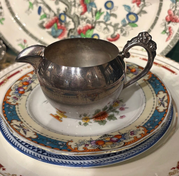 VINTAGE SILVER PLATE CREAMER WITH FLORAL ACCENTS