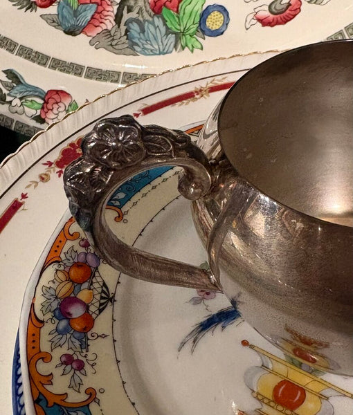VINTAGE SILVER PLATE CREAMER WITH FLORAL ACCENTS