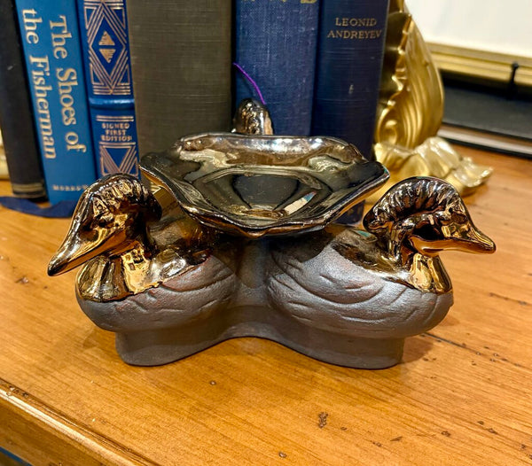 MID CENTURY BRASS AND POTTERY ASH TRAY OR TRICKET BOWL FEATURING THREE DUCKS