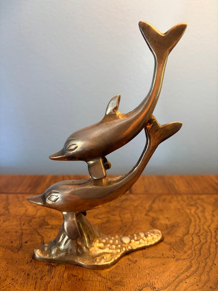 Brass double dolphin figure