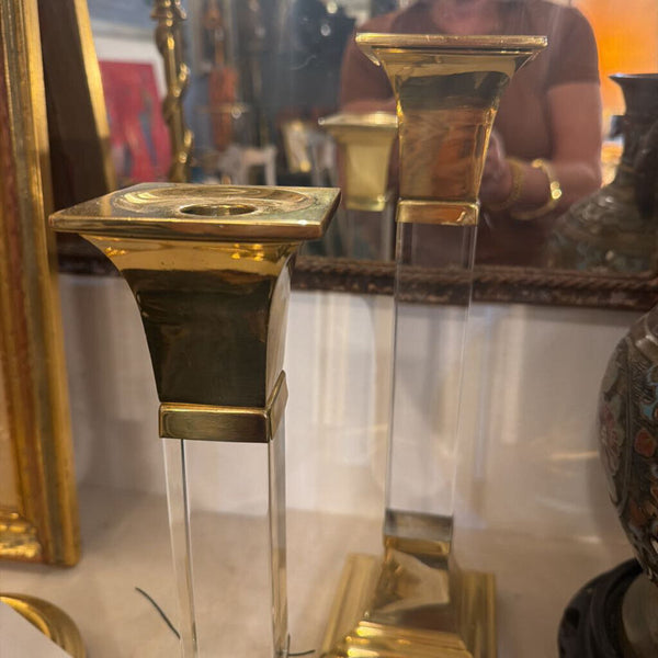 Lucite and brass candle stick Pair varying sizes