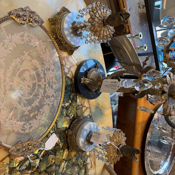 Hollywood Regency matching pair of brass and marble candleholders with cascading Strauss crystals approx 9.5t