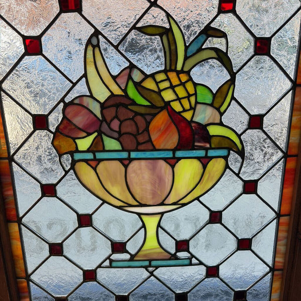 Gorgeous antique leaded glass window featuring a large fruit basket using slag glass approximately 34 1/2 x 24 1/2 for pick up only I Hooks placed for hanging