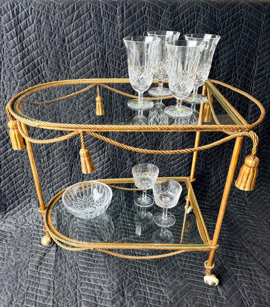Vintage Italian Hollywood Regency gold gilt rope and tassel motif 2 tier bar cart circa 1960-approx 25.5t x29L x19. For pick up only