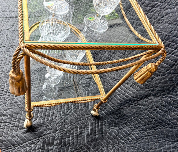 Vintage Italian Hollywood Regency gold gilt rope and tassel motif 2 tier bar cart circa 1960-approx 25.5t x29L x19. For pick up only