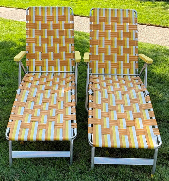 VINTAGE ALUMINUM WEBBED LOUNGE CHAIRS - A PAIR