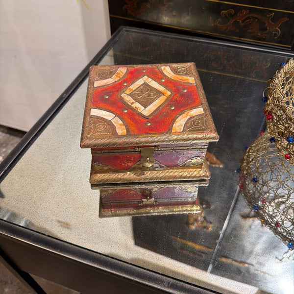 Vintage trinket box with gold embellishments