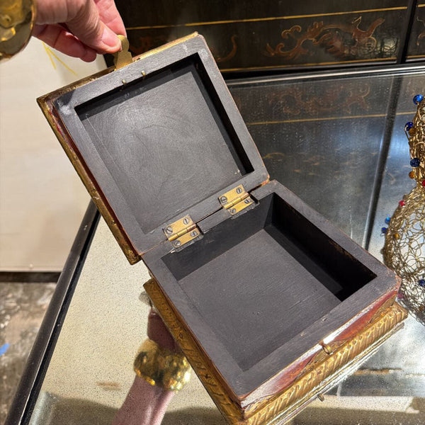 Vintage trinket box with gold embellishments