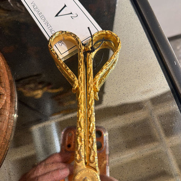 Gold ornate Tongs