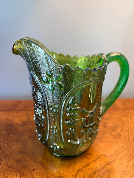 Green windmill carnival glass pitcher