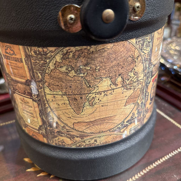 Vintage ice bucket with maps and labels