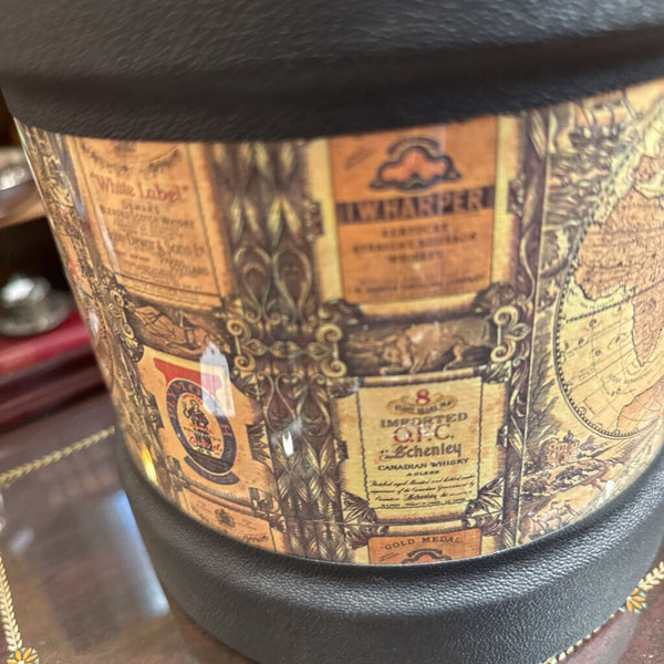 Vintage ice bucket with maps and labels