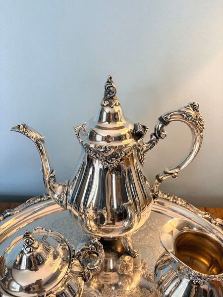 Fabulous vintage Wallace "Baroque" silver plate 5 piece coffee service with approx 24x15 handled tray, coffee pot, sugar with lid and creamer