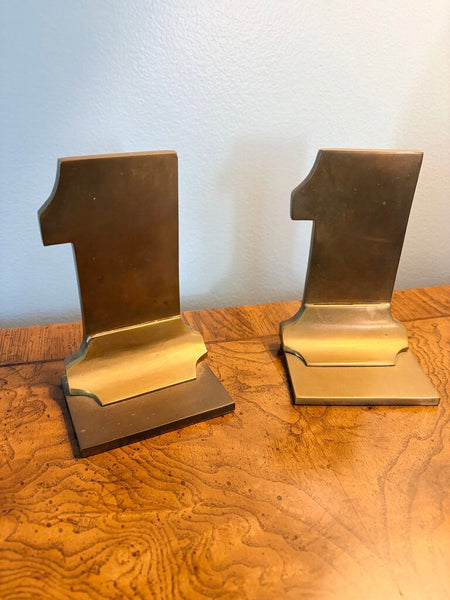 Heavy vintage brass number 1 pair of bookends