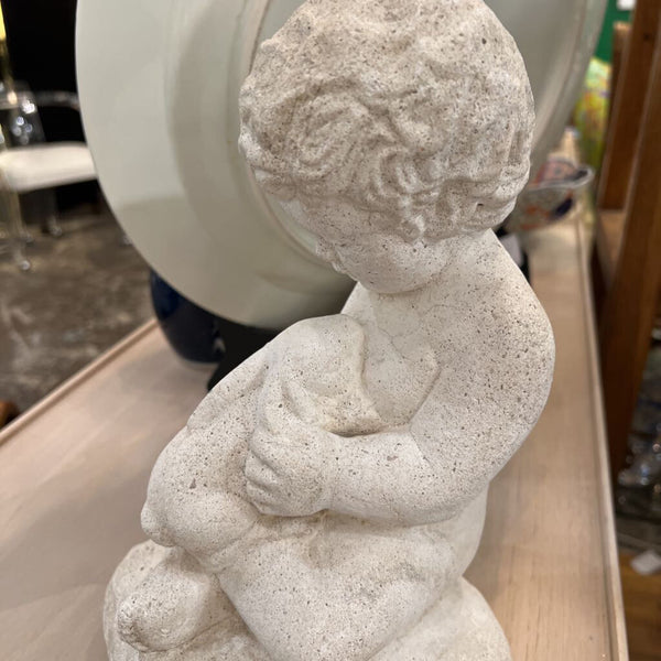 Stone Statue of child with bunny