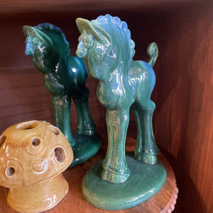 Pair of green/blue ceramic horse