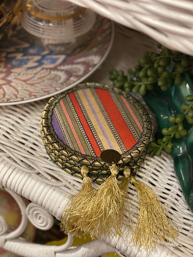 Set of four striped coasters with tassels