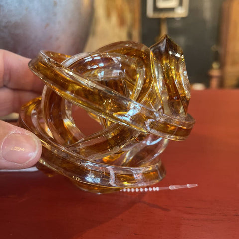 Amber glass knot