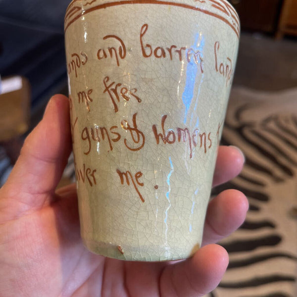 Pottery cup with verse